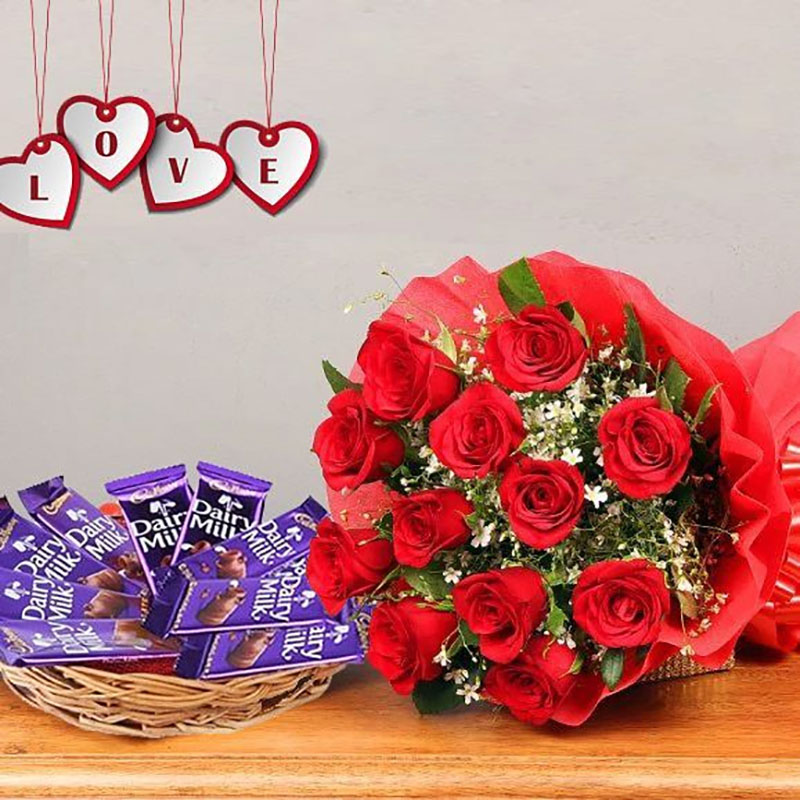 Send 12 Red Roses with Dairy Milk Rose Day Gift Online VL23110451
