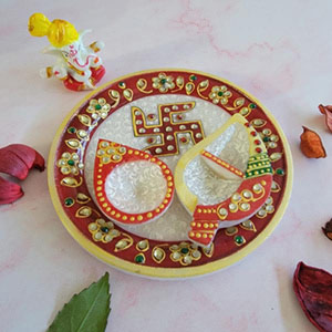 White Diya swastik thali with ganpati idol