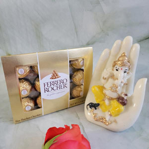 Palm ganesha idol with tasty ferrero rochers