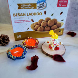 besan laddoo with Diyas and idol