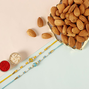 Sneh Vibrant Set Of 2 Pearl Rakhis & Almonds