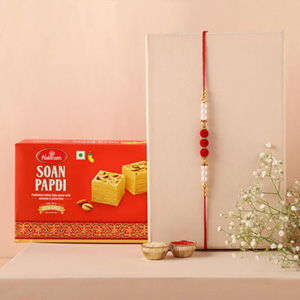Sneh Red White Pearl Rakhi & Soan Papdi