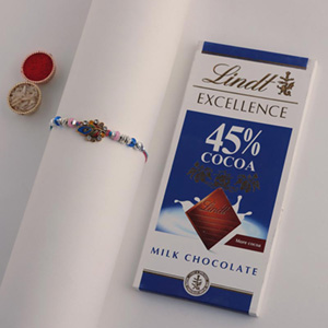 Sneh Designer Peacock Rakhi & Lindt Bar