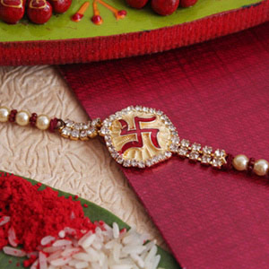 Opulent Golden Swastika Rakhi