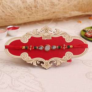 Enticing Meenakari AD Stone Rakhi