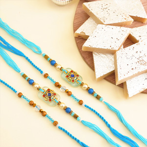 Combo of Four Designer Rakhis with Kaju Katli