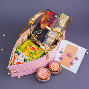 Ganesha Idol with Chocolates Hamper in Boat Shaped Basket