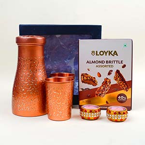 Graceful Copper Gift Set with Decorative Diyas and Sweet