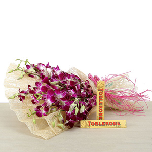 Purple Orchids in Jute Wrapping N Toblerone Chocolates