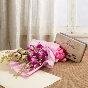 Purple Orchids with Celebrations Rich Dry Fruit 