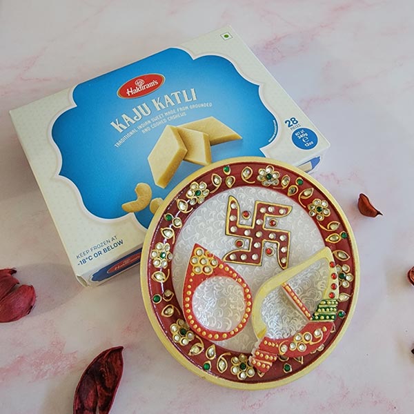 Send White and maroon pooja thali with Kaju katli Online