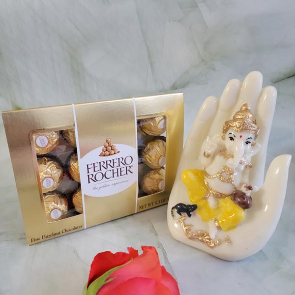 Send Palm ganesha idol with tasty ferrero rochers Online