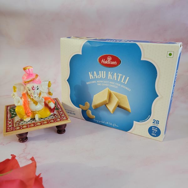 Send Ganpati Viranjman idol with kaju katli Online