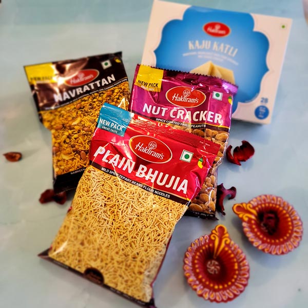 Send 3 namkeen combo with kaju katli and diyas Online