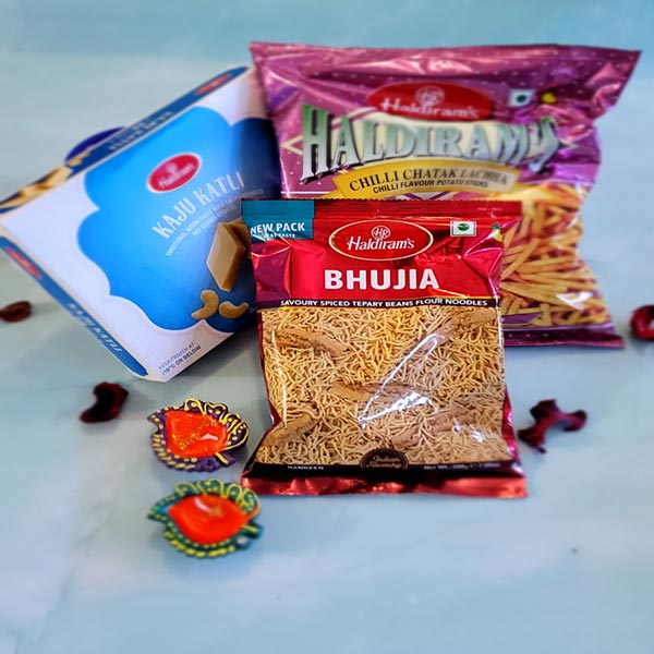 Send Two namkeen combo with haldiram kaju katli and diyas Online