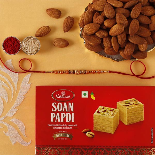 Send Sneh Minimalist Rakhi With Soan Papdi & Almonds Online