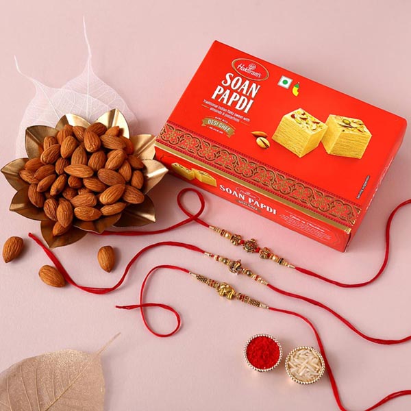 Send Sneh Feng Shui Rakhi Set With Soan Papdi & Almonds Online