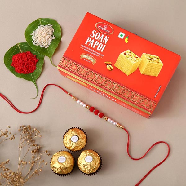 Send Sneh Lovely Rakhi With Soan Papdi & Ferrero Rocher Online