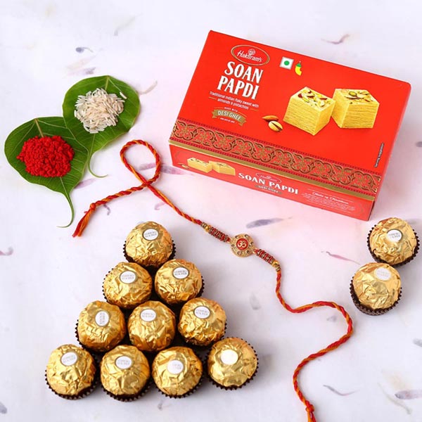 Send Sneh Om Rakhi With Soan Papdi & Ferrero Rocher Online