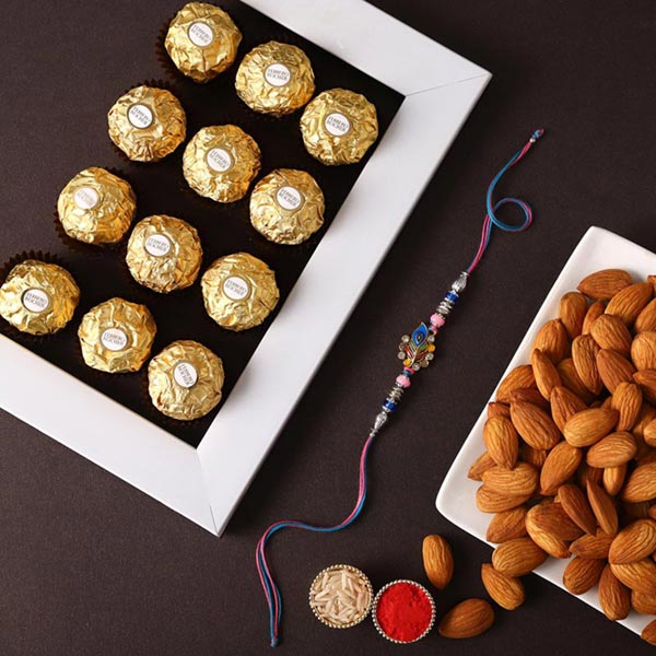Send Sneh Peacock Rakhi With Almonds & Ferrero Rocher Online