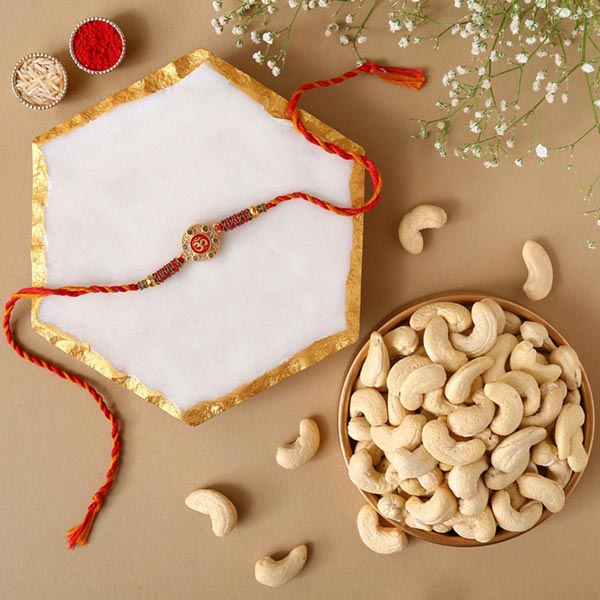 Send Sneh Holy Om Rakhi & Cashews Online