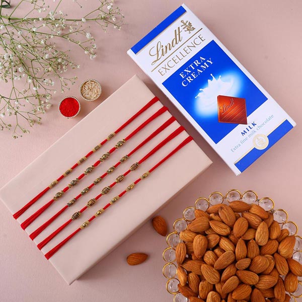 Send Sneh Classy Rakhi Set With Lindt Chocolates & Almonds Online