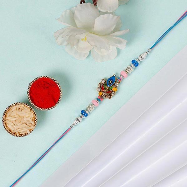 Send Sneh Elegant Peacock Feather Rakhi to Qatar Online