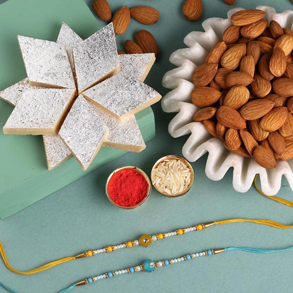 Send Sneh Vibrant Pearl Rakhis With Kaju Katli & Almonds Online