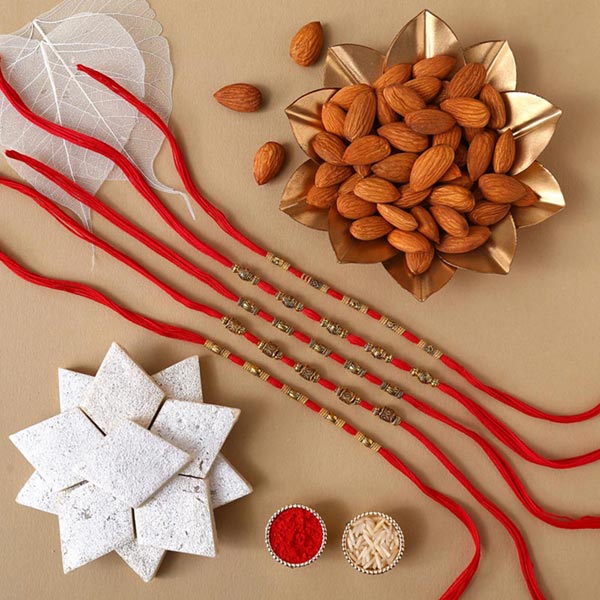 Send Sneh Red Rakhis With Kaju Katli & Almonds Online