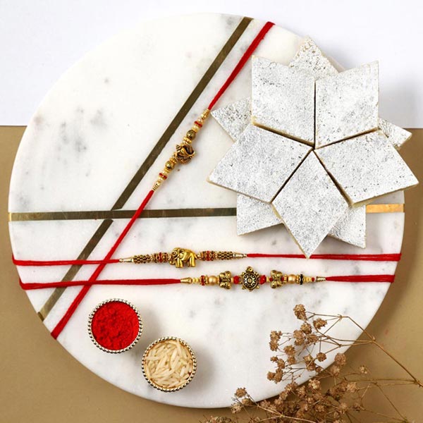 Send Sneh Feng Shui Rakhi Set & Kaju Katli Online