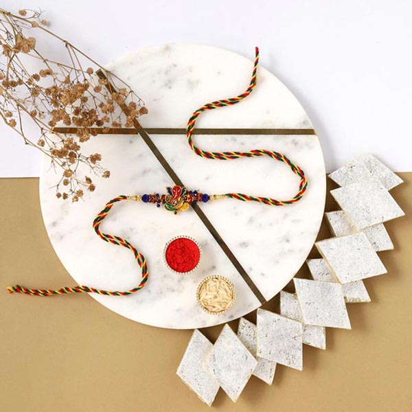 Send Sneh Ganesha Rakhi & Kaju Katli Online