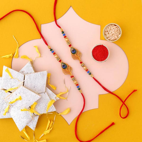 Send Sneh Peacock Feather Rakhi & Kaju Katli Online
