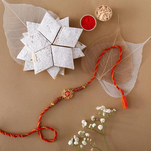 Send Sneh Red Om Rakhi & Kaju Katli Online