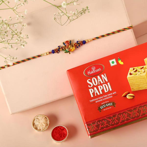 Send Sneh Ganesha Rakhi & Soan Papdi Online