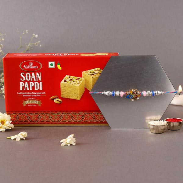 Send Sneh Blue Peacock Rakhi & Soan Papdi Online