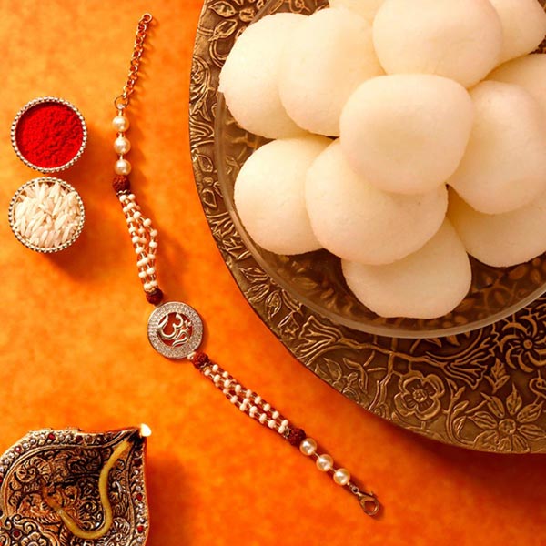 Send Sneh Holy Om Rakhi & Rasgullas Online