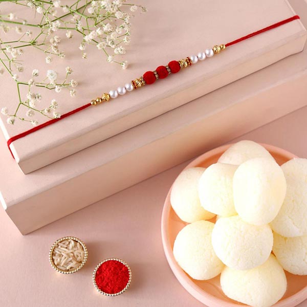 Send Sneh Red White Pearl Rakhi & Rasgullas Online