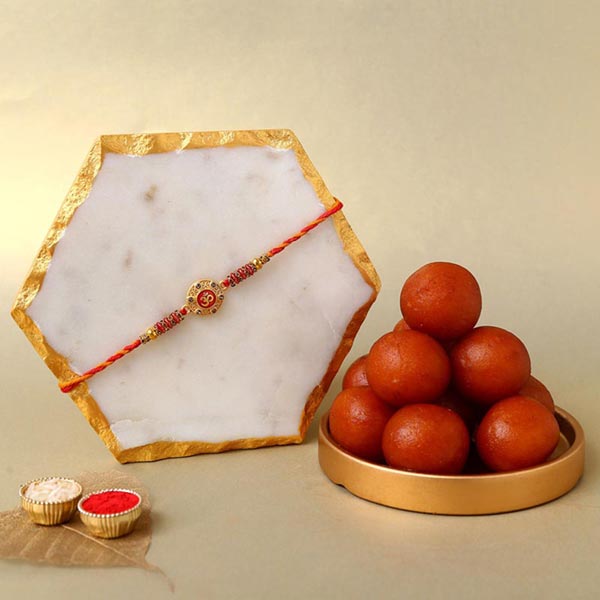 Send Sneh Holy Om Rakhi & Gulab Jamun Online