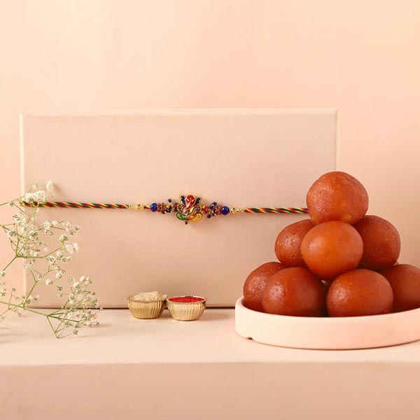 Send Sneh Auspicious Ganesha Rakhi & Gulab Jamun Online