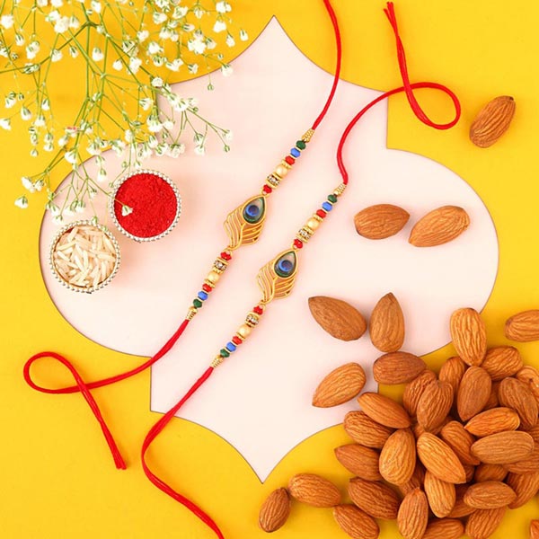 Send Sneh Peacock Feather Rakhi & Almonds Online