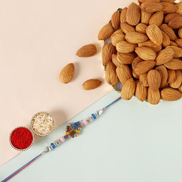 Send Sneh Designer Peacock Rakhi & Almonds Online