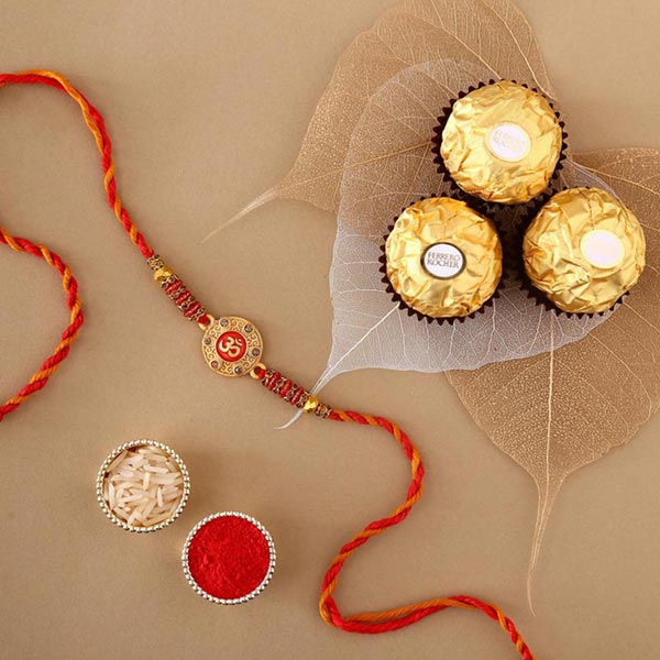 Send Sneh Holy Om Rakhi & Ferrero Rocher Online