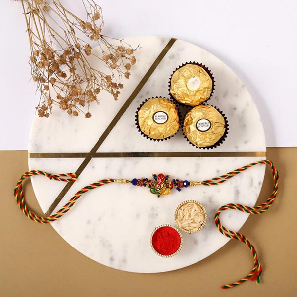 Send Sneh Auspicious Ganesha Rakhi & Ferrero Rocher Online