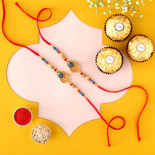Send Sneh Peacock Feather Rakhi & Ferrero Rocher Online