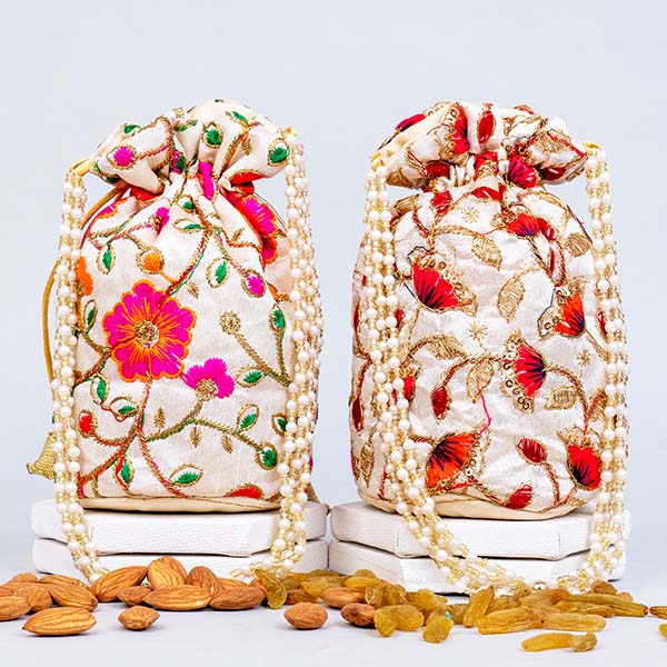 Send Designer Potlis with Almonds and Raisins Gift Pack Online