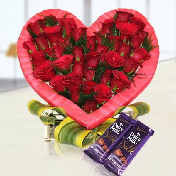 Send Heartshaped Rose Arrangement with Dairy Milk Silk Online